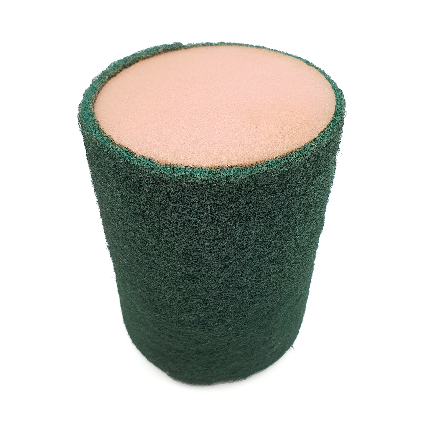A cylindrical foam sponge block with a dark green textured outer layer and a light peach-pink inner face, isolated on a white background.