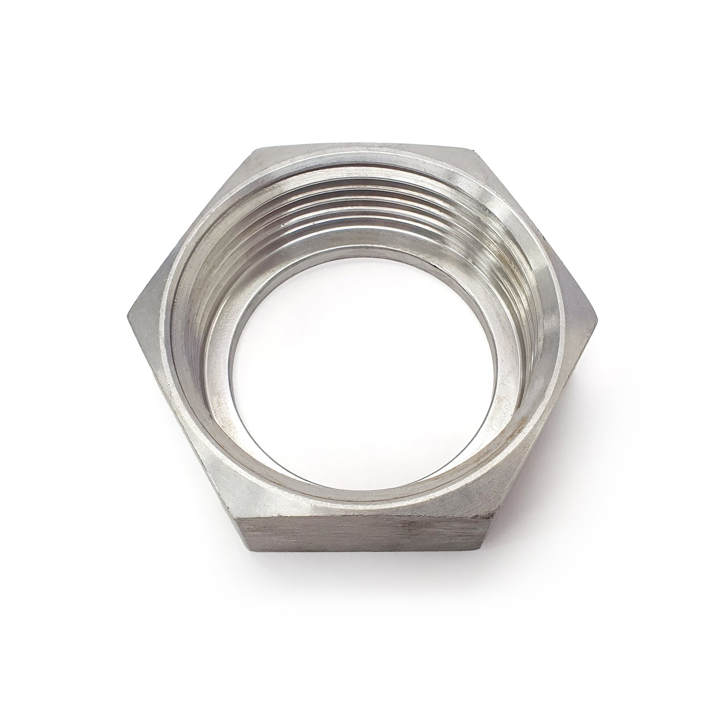Metal hex nut on a white background
