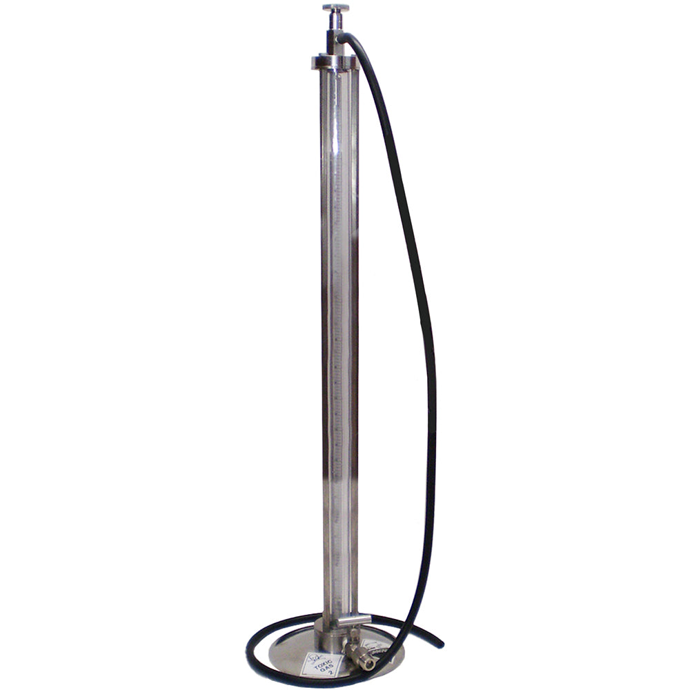 A stainless steel sulphitometer with a circular base, a tall vertical tube, and a black hose attached, shown against a plain white background.