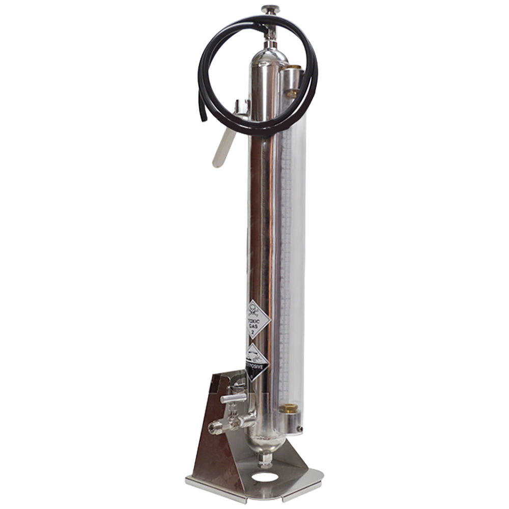 A stainless steel sulphitometer with a vertical column, a flat base, a black hose loop at the top, and a clear cylindrical chamber, shown on a plain white background.