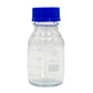 Clear glass bottle with blue cap on a white background