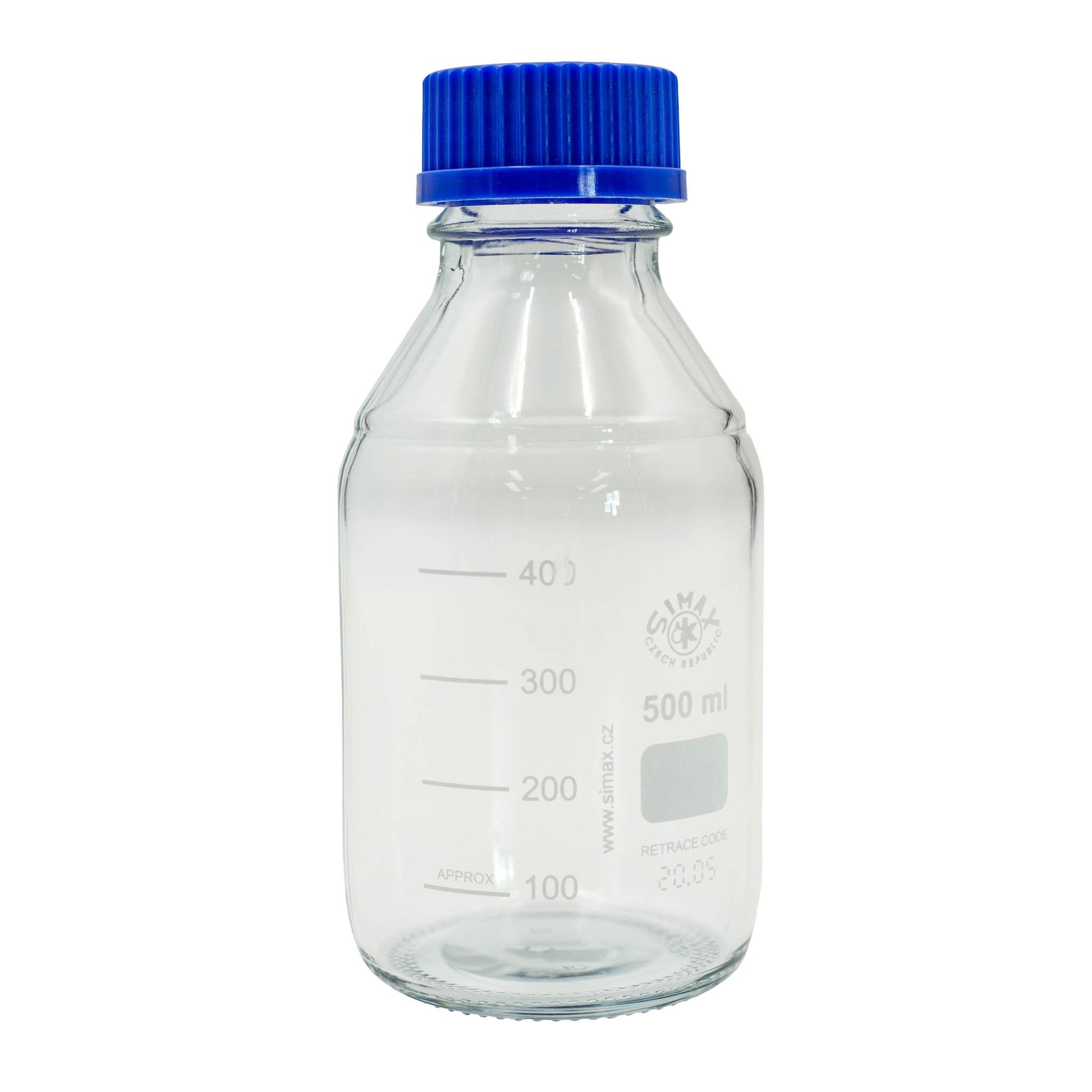 Clear glass bottle with blue cap on a white background