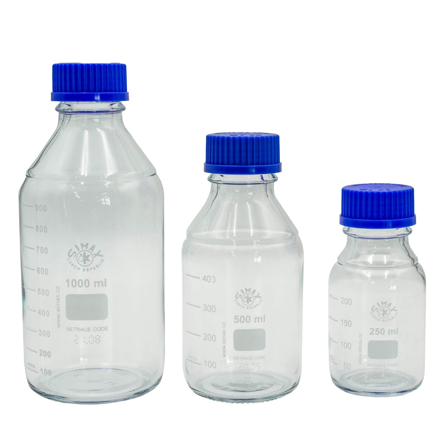 Three clear glass bottles with blue lids on a white background
