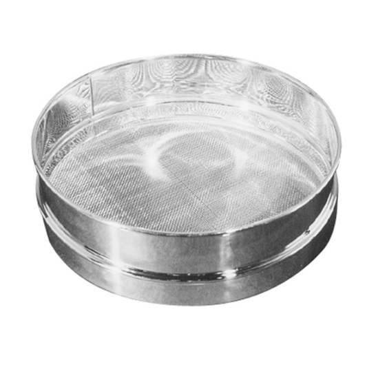 Metallic sieve on a white background