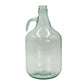 Clear glass growler with handle on a white background