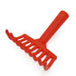 Red plastic rake on a white background