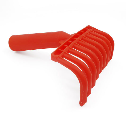 Red plastic tool with a handle on a white background