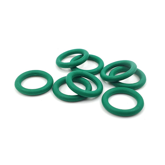 Green rubber o-rings on a white background