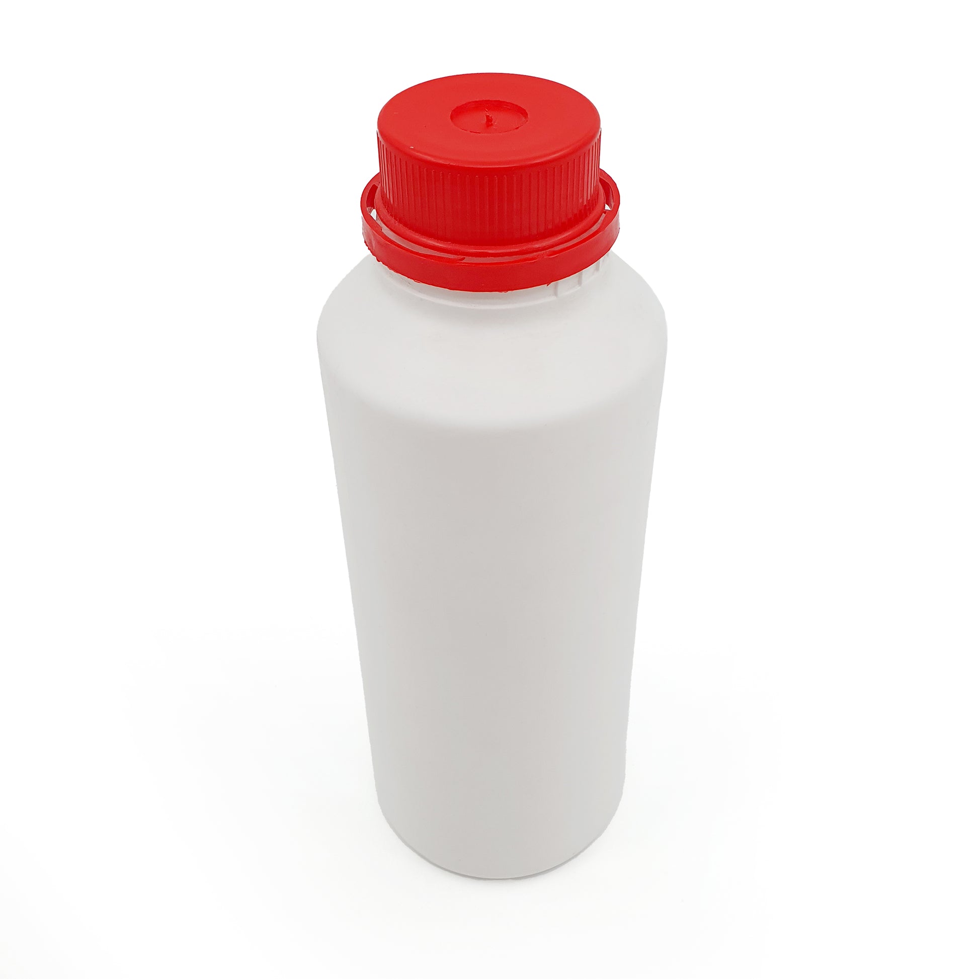 White bottle with a red cap on a white background