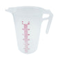White measuring cup with red measurement markings on a white background