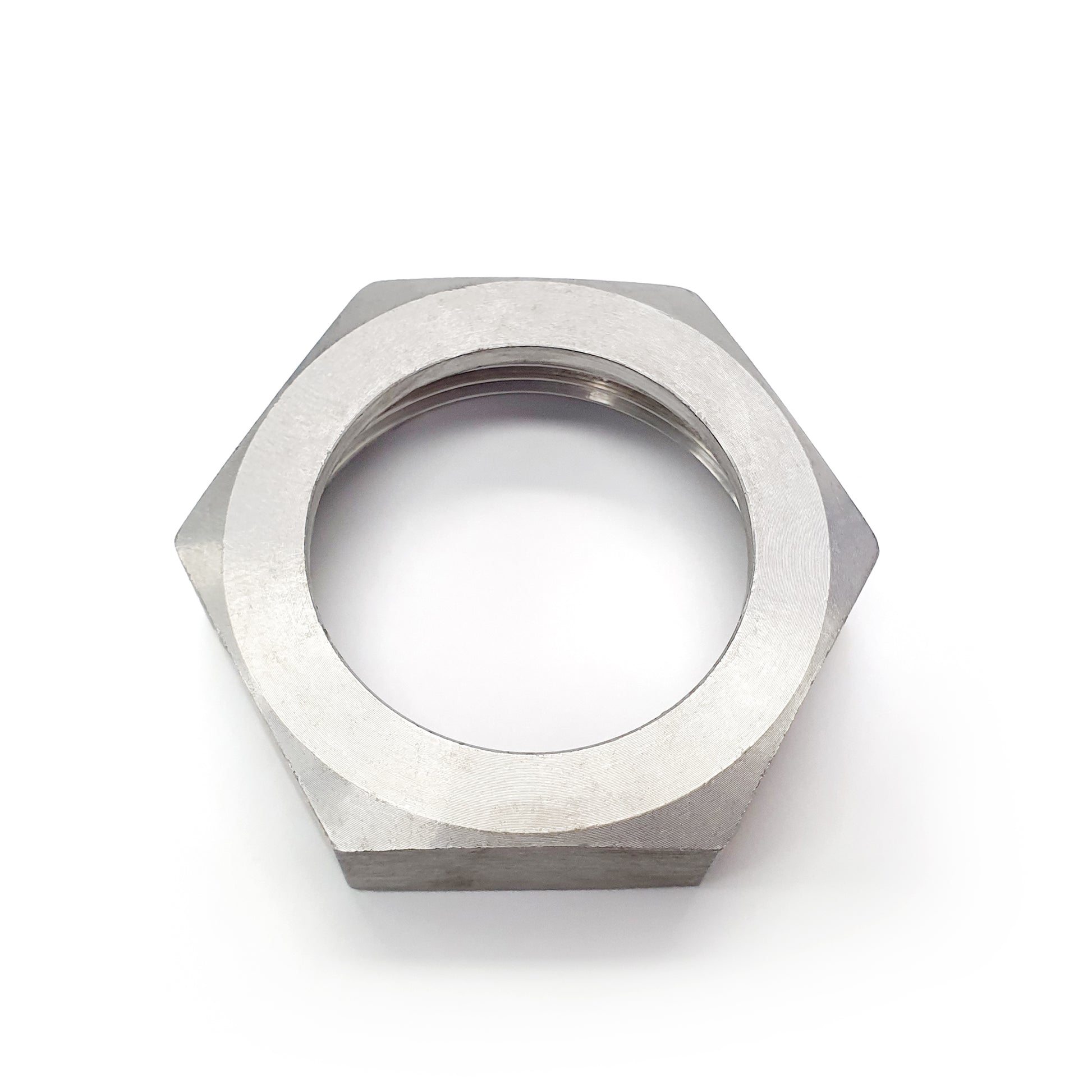Metallic hex nut on a white background