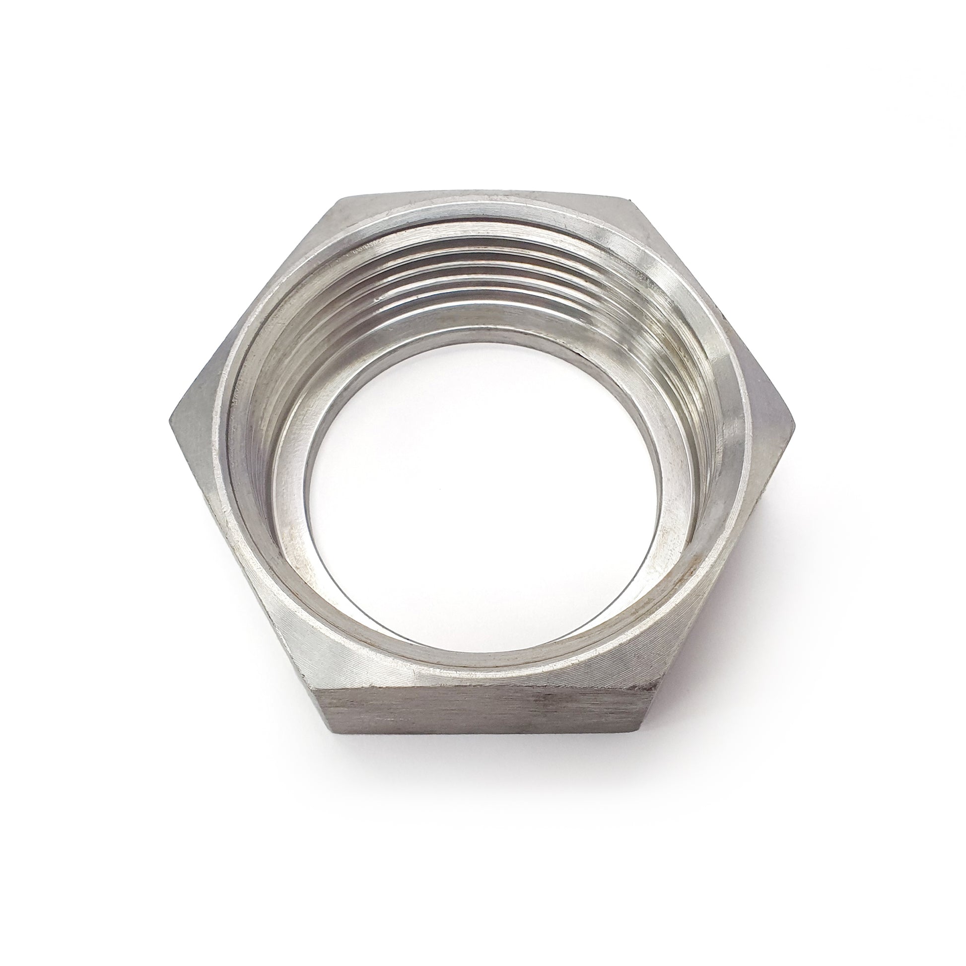 Metal hex nut on a white background