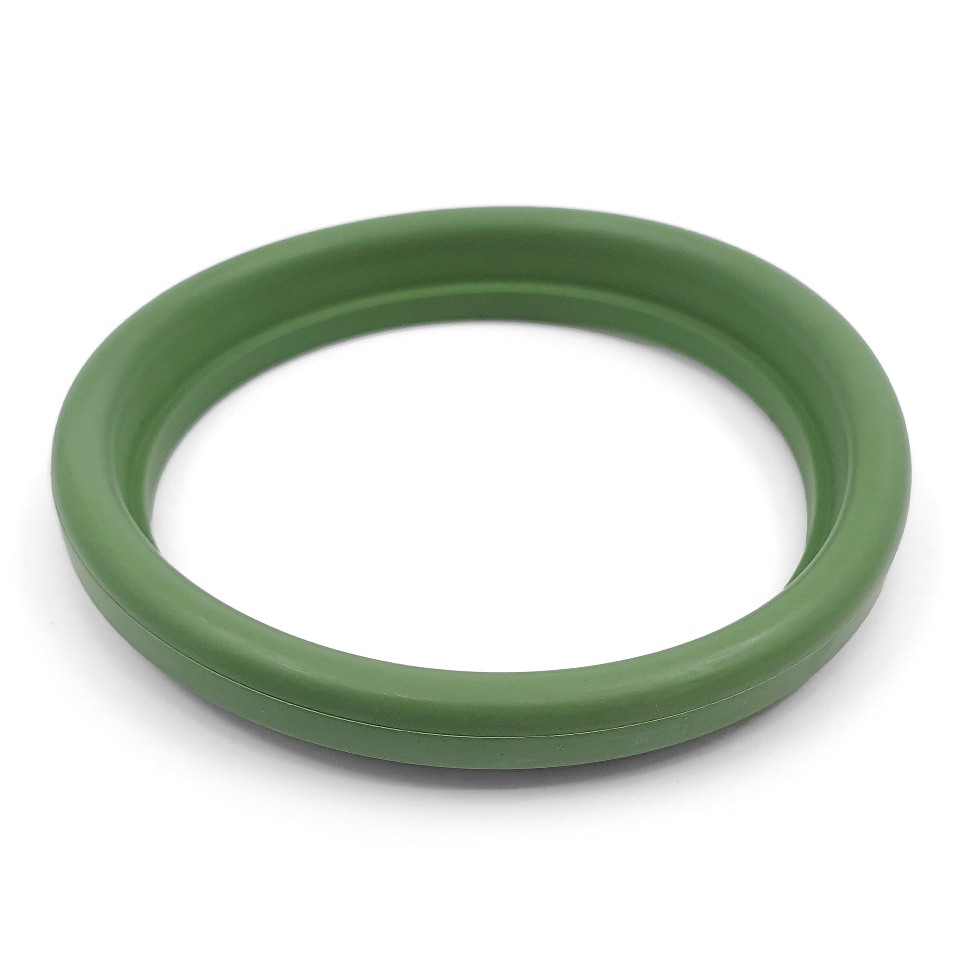 Green rubber gasket on a white background