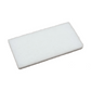 A rectangular white scourer pad block with a textured, porous surface, shown at an angle on a plain white background.
