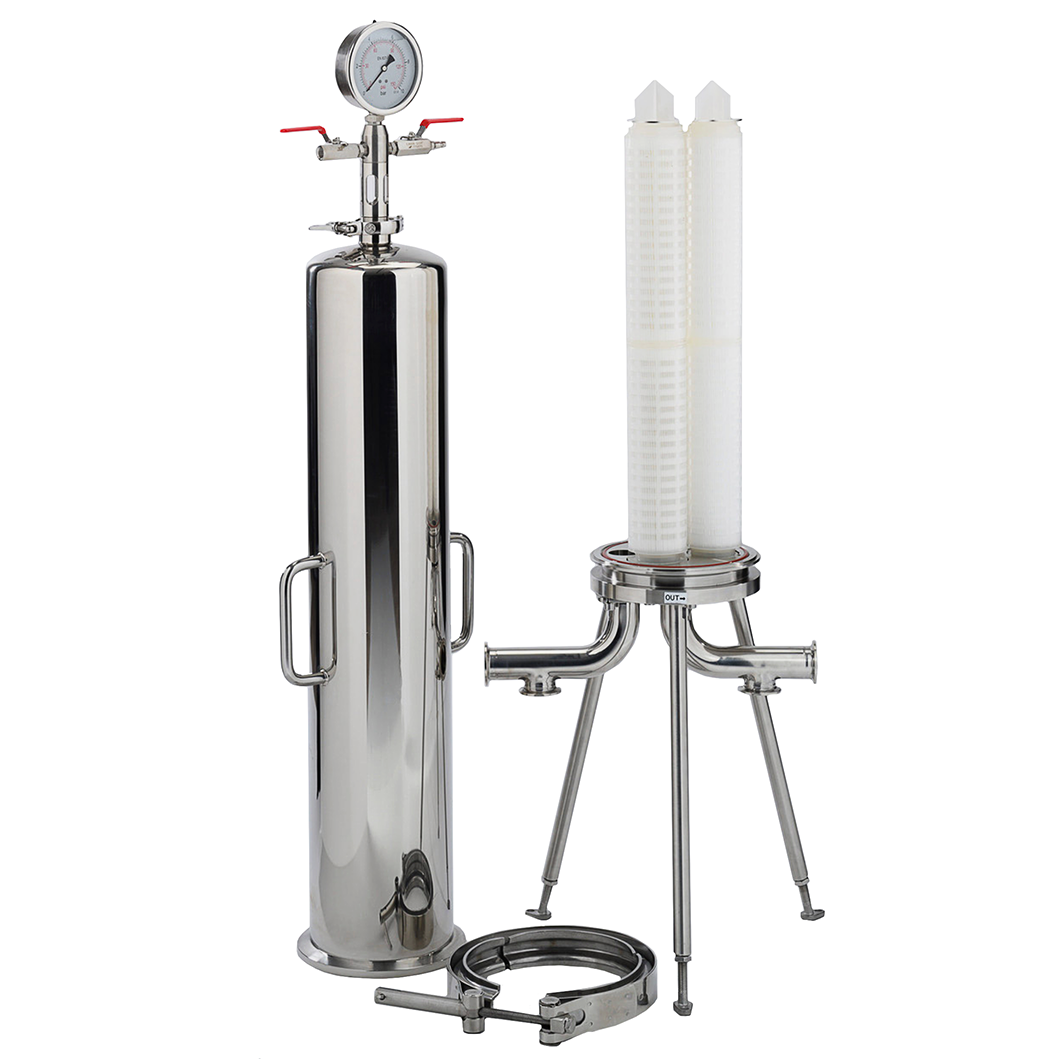 A stainless steel liquid filtration system set on a white background, featuring a tall cylindrical pressure vessel with a dial gauge, a dual-column filter cartridge on a stand, and a clamp fitting.